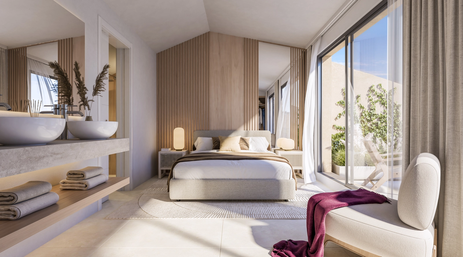 Hovedsoverommet, et fredelig tilfluktssted med åpen løsning til bad og direkte tilgang til en privat terrasse.