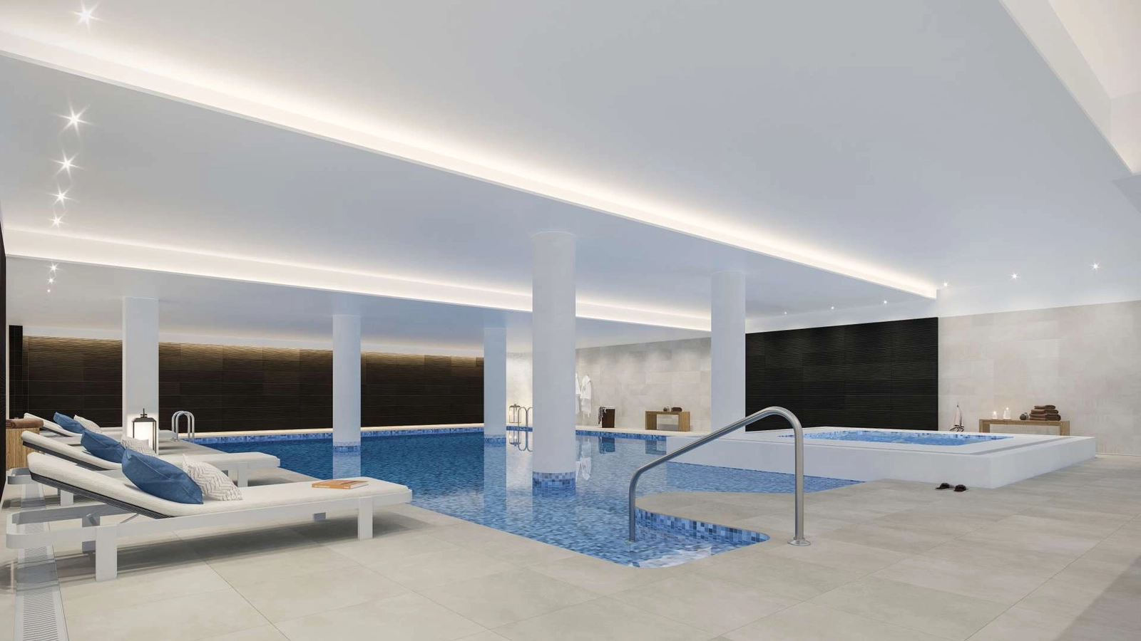 Slapp av og koble av hele året i det eksklusive innendørs svømmebassenget og spa-området.