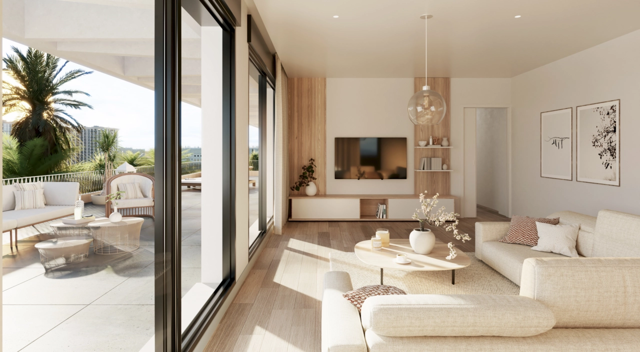 En lys, innbydende stue som sømløst knytter seg til en romslig privat terrasse, perfekt for å nyte klimaet på Costa del Sol.