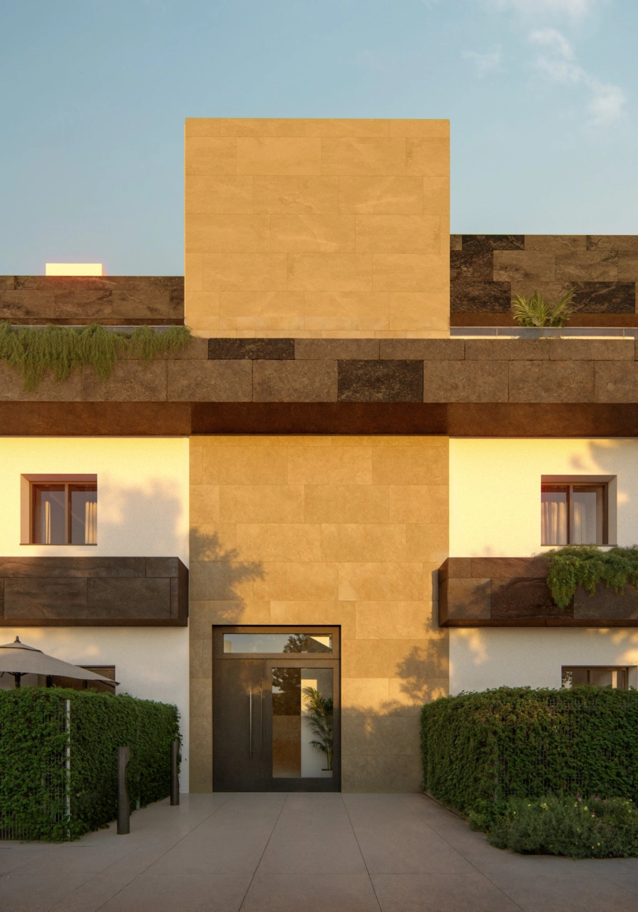 En detaljert visning av den moderne arkitekturen og hovedinngangen til eiendommene.