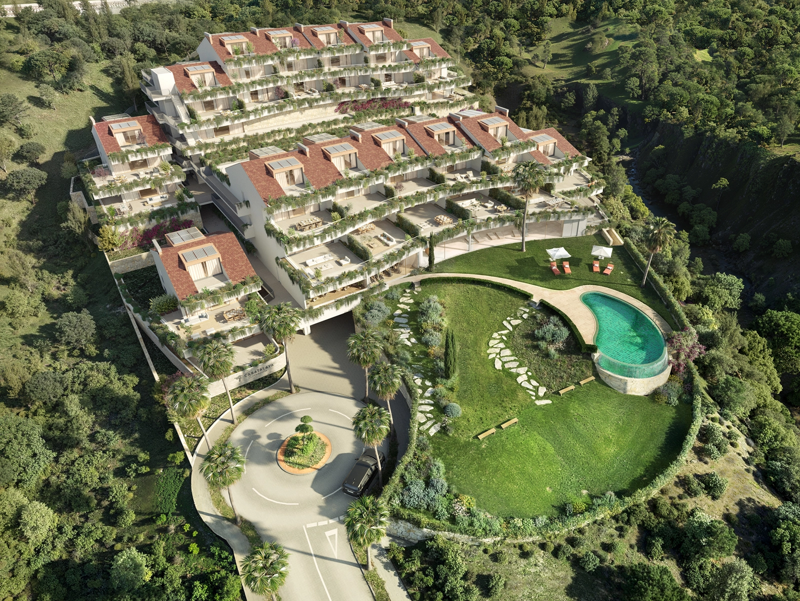 En imponerende utsikt over hele prosjektet, som fremhever den unike terrasserte arkitekturen og de grønne omgivelsene.