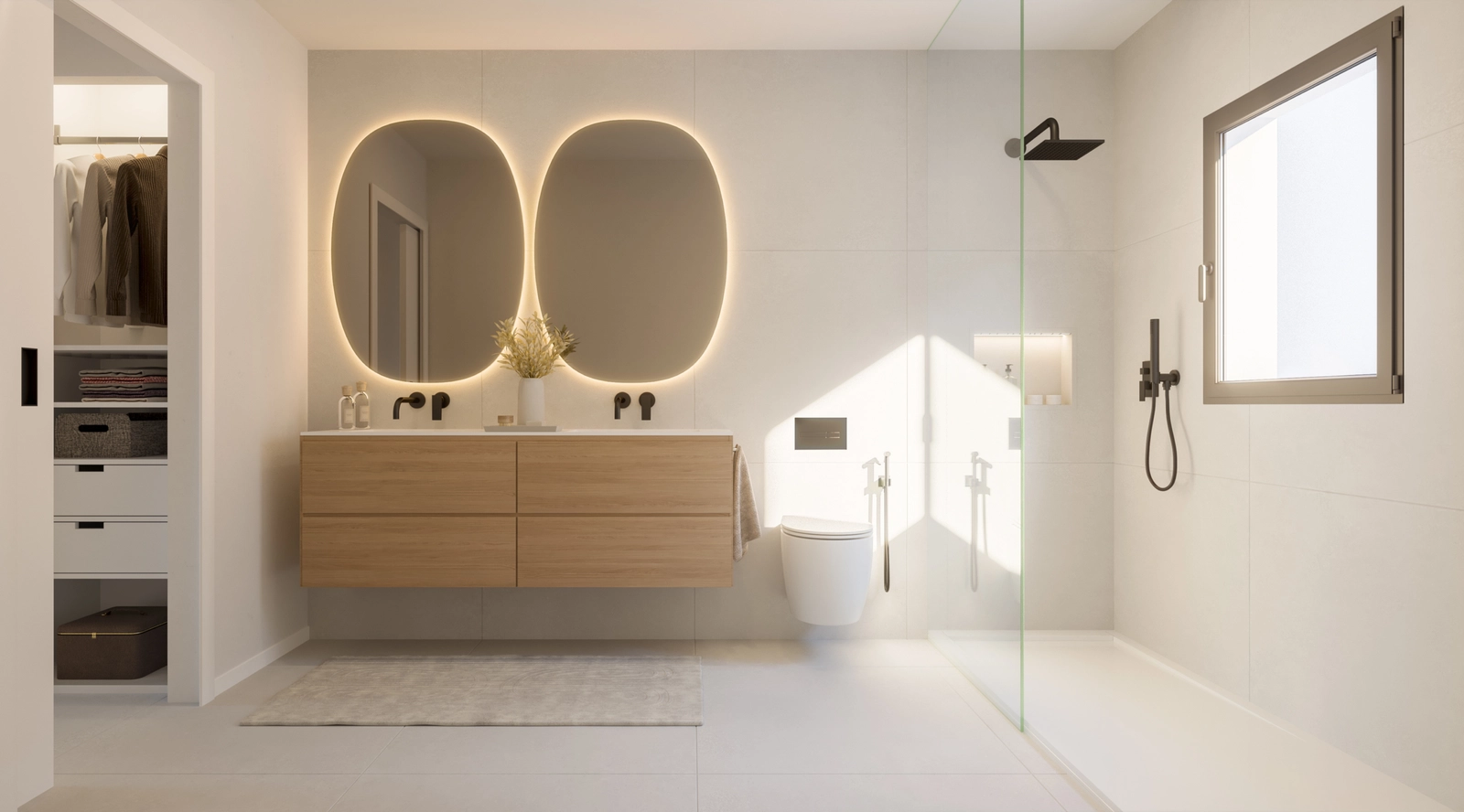 Et lyst og moderne bad med høykvalitetsinnredning og en romslig walk-in dusj.