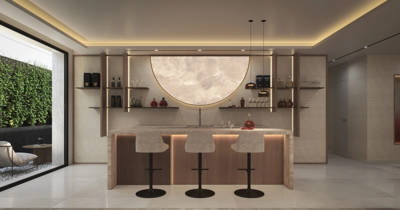 Et stilfullt bar- og loungeområde i kjelleren tilbyr en sofistikert plass for å arrangere venner og familie.