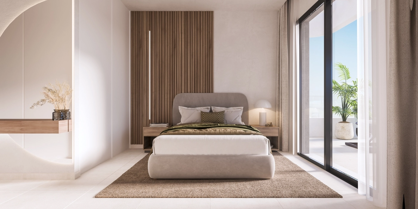 Et rolig hovedsoverom med moderne design og direkte utgang til en privat terrasse, som skaper et personlig tilfluktssted.