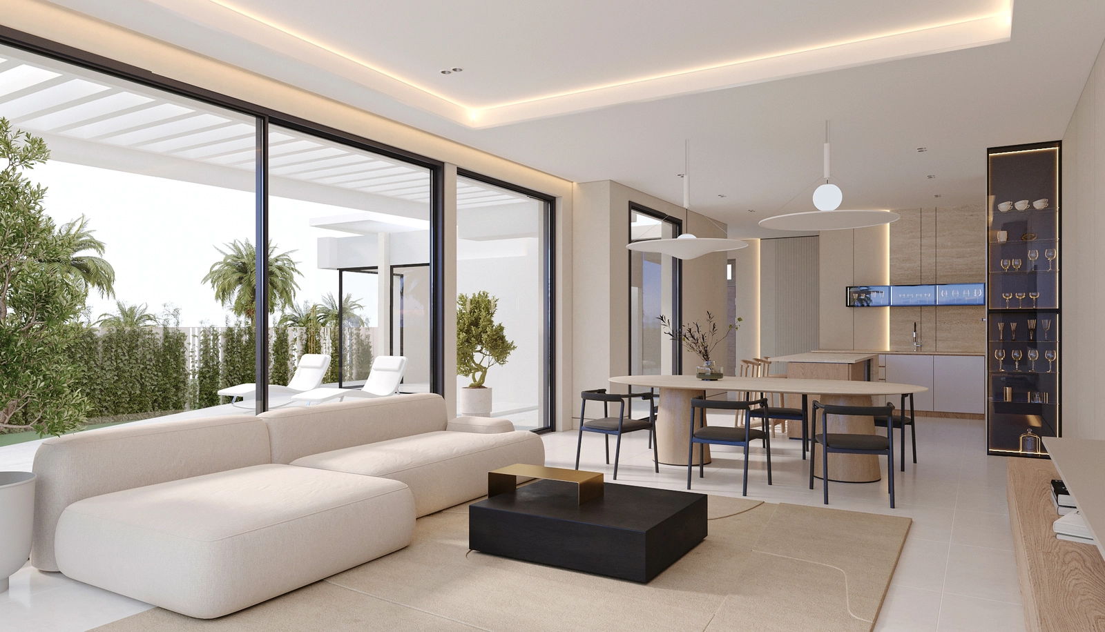 Den lyse, åpne stue- og spiseplassen har sømløs tilgang til utendørsterrassen.