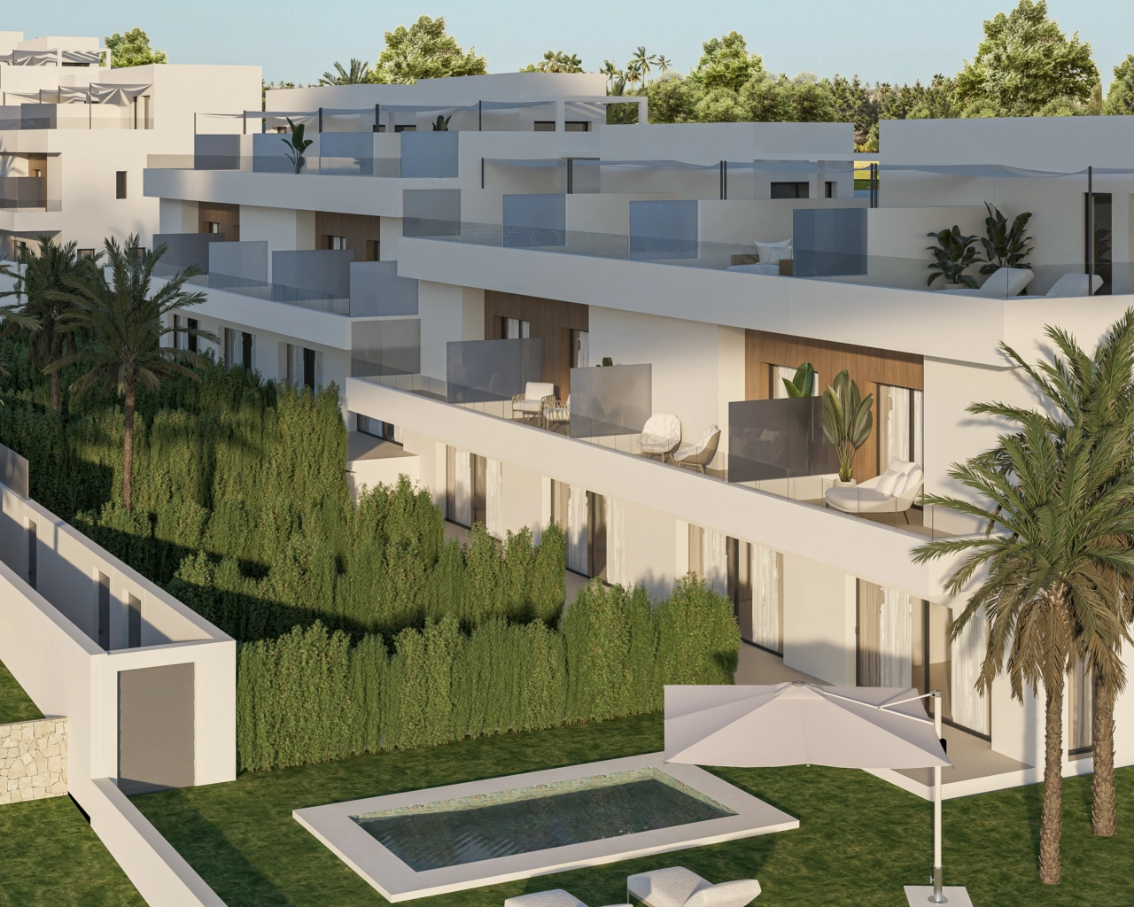 En luftfoto av utbyggingen, som viser den moderne arkitekturen og de private hagene.