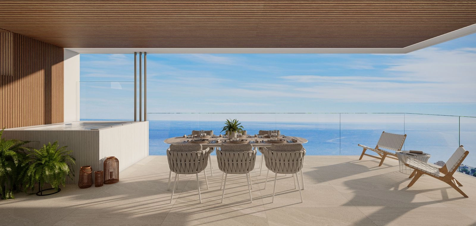 En romslig privat terrasse med boblebad, som tilbyr fantastisk havutsikt over Costa del Sol.