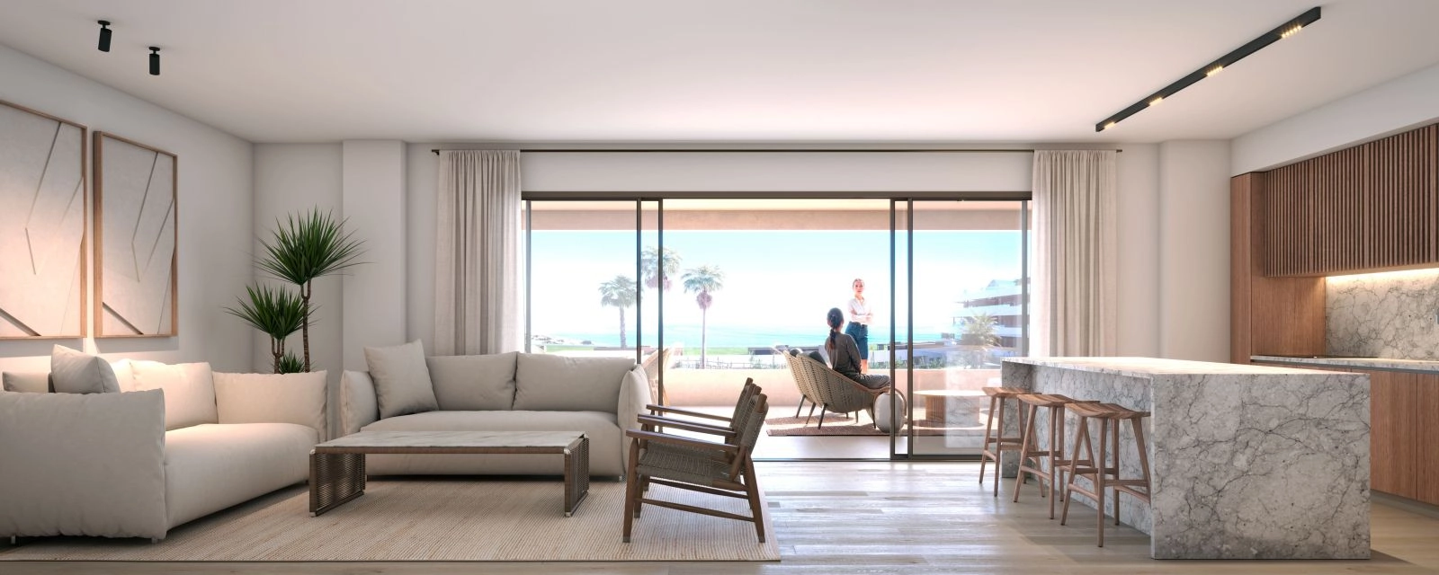 Det åpne kjøkken- og stueområdet, designet for moderne livsstil og sømløs overgang mellom inne og ute.