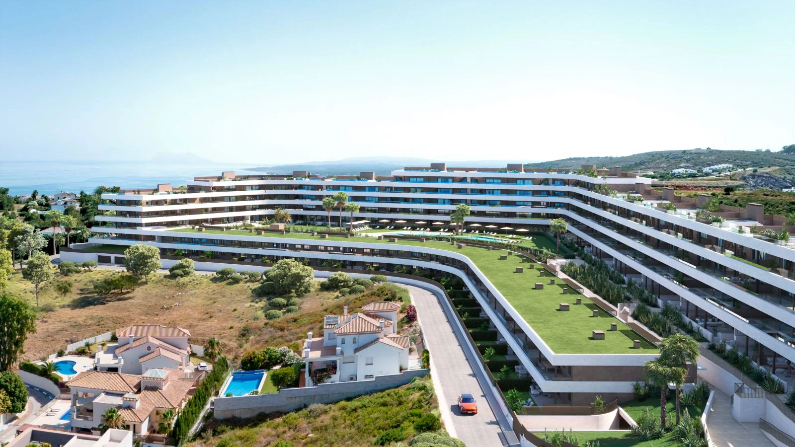 Et fugleperspektiv av prosjektets moderne arkitektur, innlemmet i landskapet på Costa del Sol.