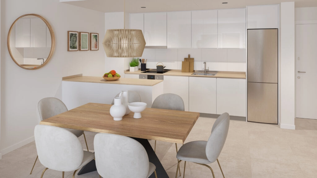 Et moderne kjøkken med åpen løsning, fullt utstyrt med hvitevarer av høy kvalitet, designet for både dagliglivet og underholdning.
