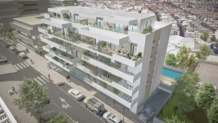 En oversikt over utbyggingen, som fremhever dens moderne arkitektur og felles bassengområde.