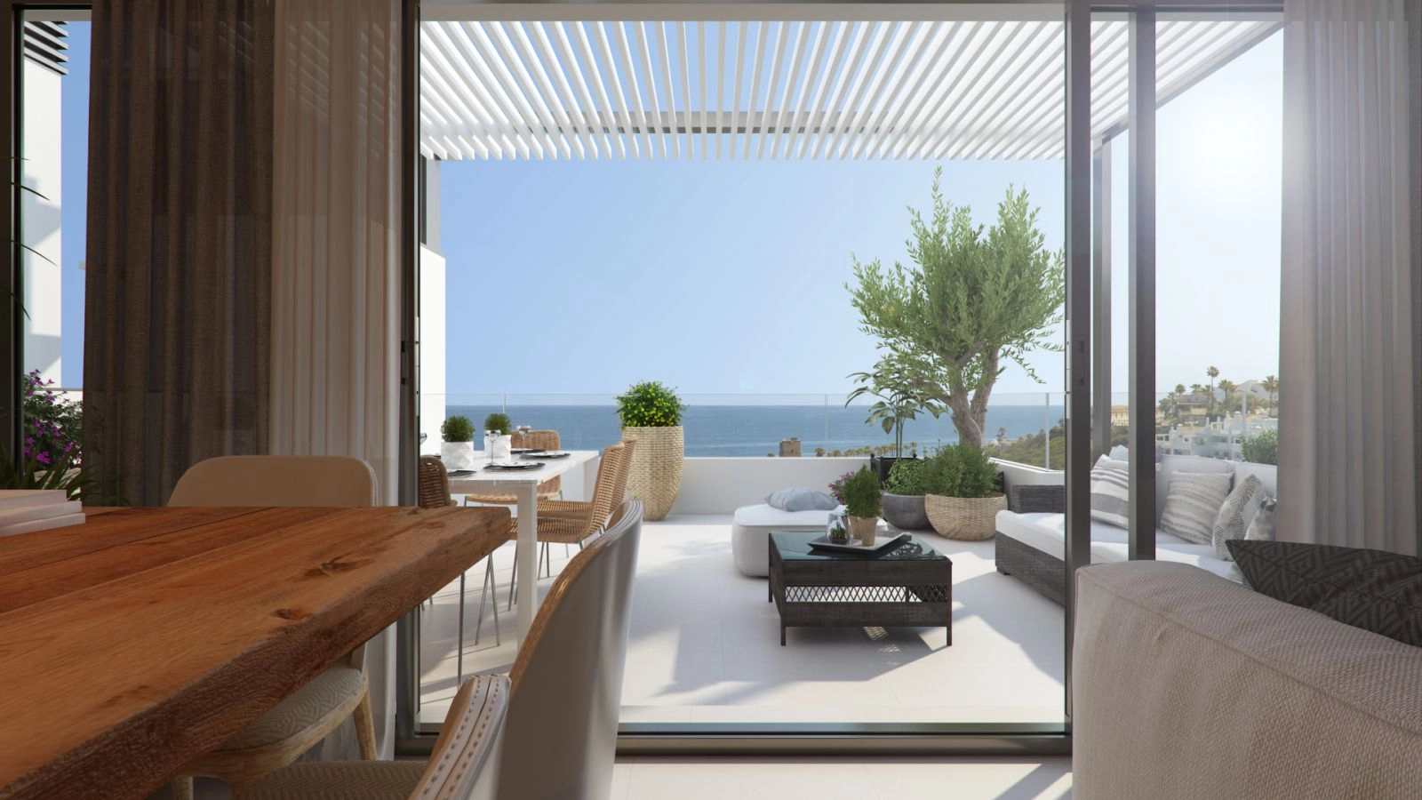 Sømløst innendørs- og utendørsliv, med romslige terrasser designet for å nyte den fantastiske havutsikten.