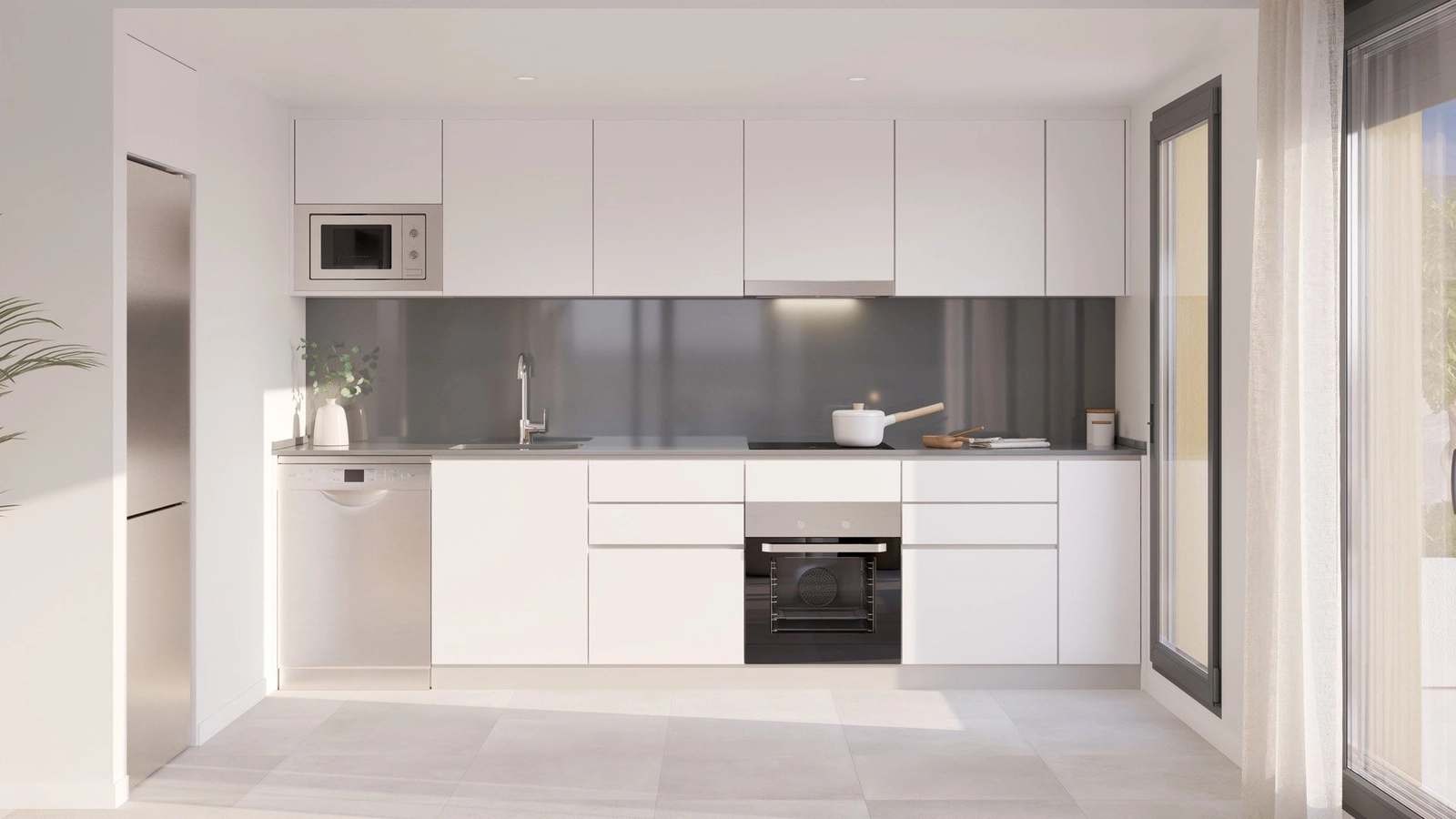 Det fullt utstyrte kjøkkenet har et elegant, minimalistisk design med hvitevarer av høy kvalitet.