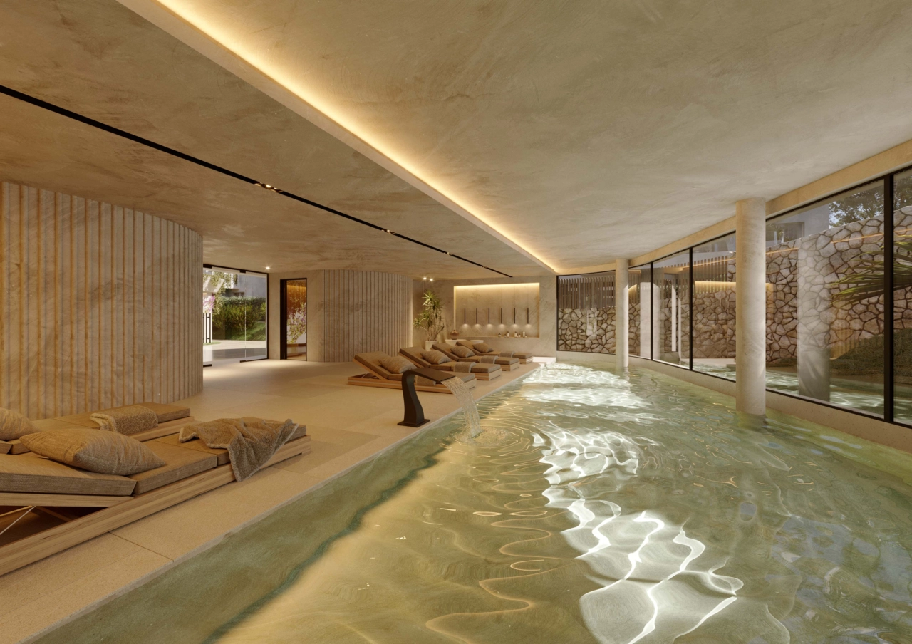 Det innendørs spa-området har et oppvarmet basseng og solsenger, og tilbyr beboerne en fredelig flukt.