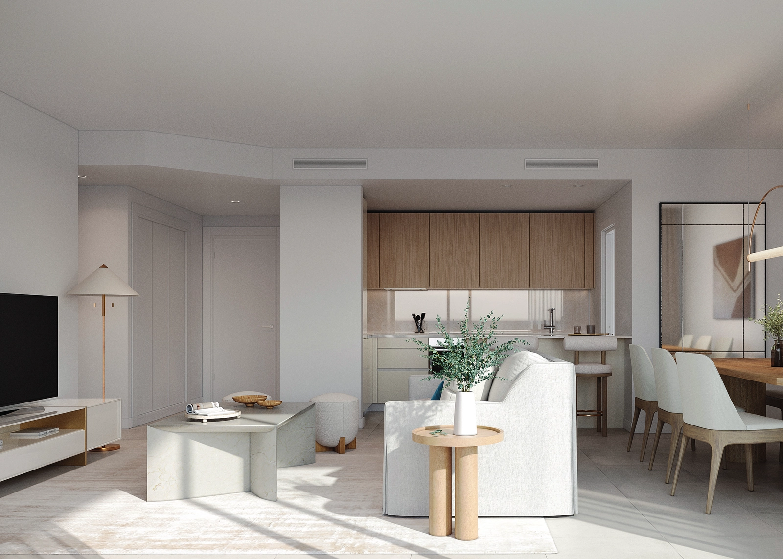 Lyse og åpne oppholdsrom som flyter sømløst, fylt med naturlig lys.